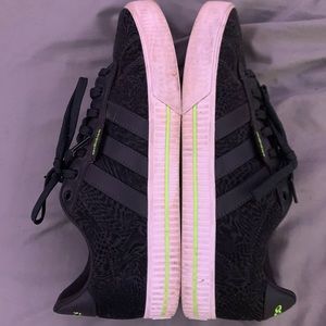 green, white, black adidas.